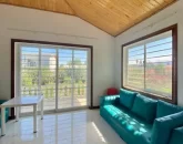 دیزاین با مبلمان آبی رنگ اتاق نورگیر ویلا در خورشیدکلا 64516