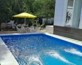 میز وصندلی باغی و استخر ویلا در جویبار