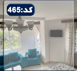 اتاق پذیرایی با تلوزیون دیواری و پنجره های آپارتمان در ساری 526844