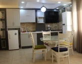 آشپزخانه با کابینت ها و یخچال خانه ویلایی در جویبار 45874568347