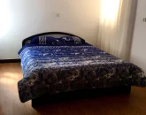 اتاق خواب به همراه تخت دو نفره آپارتمان در قائمشهر 47506483564