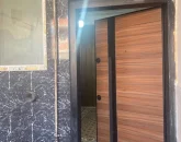 درب ورودی چوبی به همراه نمای سنگ ویلا در زاغمرز 47856847658