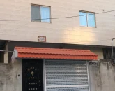 نمای بیرونی ساختمان دو طبقه آپارتمان در قائمشهر 435436584056