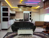 کاناپه در اتاق پذیرایی و آشپزخانه ویلا در ساری 47504657856