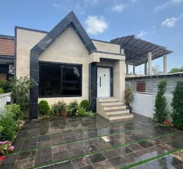 نمای بیرونی شیشه ای و سنگی ویلای فلت 150 متری در ساری 0158145687489798