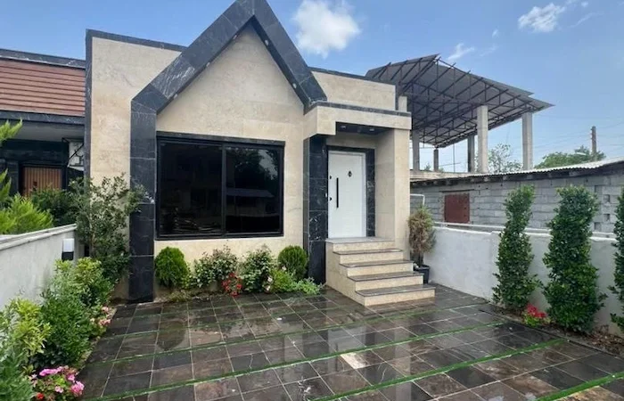 نمای بیرونی شیشه ای و سنگی ویلای فلت 150 متری در ساری 0158145687489798