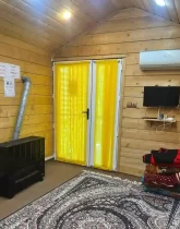 هال با درب شیشه ای و بخاری ویلا قائم شهر 25899